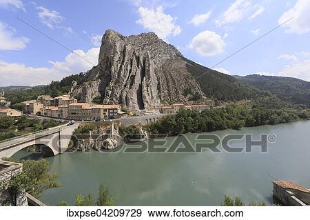 View of the Rocher de la Baume and the river Durance, Sisteron, Alpes-de-Haute-Prove, France, Europe View Large Photo Image Stock Photo - View of the Rocher de la Baume and the river Durance, Sisteron, Alpes-de-Haute-Prove, France, Europe. Fotosearch