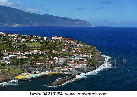 View of the town and harbor, north coast, Ponta Delgada, Madeira, Portugal, Europe View Large Photo Image Picture - View of the town and harbor, north coast, Ponta Delgada, Madeira, Portugal, Europe. Fotosearch