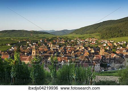 Village and vineyards at sunrise, Riquewihr, Alsace, France, Europe View Large Photo Image Stock Photograph - Village and vineyards at sunrise, Riquewihr, Alsace, France, Europe. Fotosearch