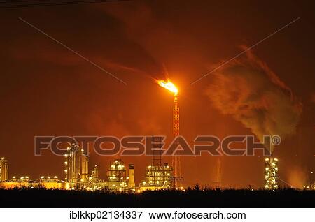 Stock Photo - A chemical plant in Leipzig at night, Saxony, Germany, Europe. Fotosearch
