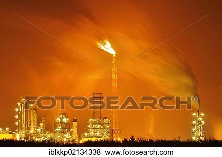 Stock Photo - A chemical plant in Leipzig at night, Saxony, Germany, Europe. Fotosearch