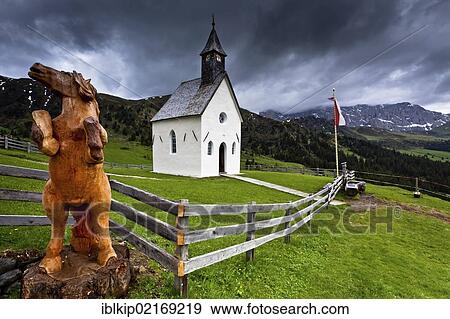 A small white chapel next to Berghaus Zallinger in Alpe di Siusi, South Tyrol, Italy, Europe View Large Photo Image Stock Photo - A small white chapel next to Berghaus Zallinger in Alpe di Siusi, South Tyrol, Italy, Europe. Fotosearch