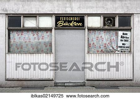 Abandoned butcher's shop with closed shutters, Projekt Gruenguertel, green belt project, Bruckhausen quarter, Duisburg, North Rhine-Westphalia, Germany, Europe View Large Photo Image Stock Photography - Abandoned butcher's shop with closed shutters, Projekt Gruenguertel, green belt project, Bruckhausen quarter, Duisburg, North Rhine-Westphalia, Germany, Europe. Fotosearch