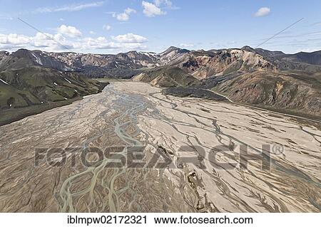 Stock Image - Aerial view, Landmannalaugar region with the coloured rhyolite mountains, Grænagil gorge and the Joekulgilskvísl River, Fjallabak Nature Reserve, Iceland, Europe. Fotosearch