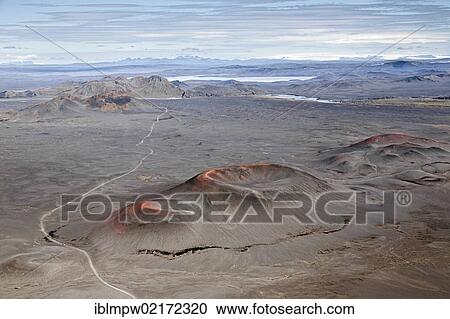 Aerial view of extinct craters with red minerals glowing on the walls near Landmannalaugar in the region of the Tungna and Skafta Rivers in the interior highlands of Iceland, Europe View Large Photo Image Stock Image - Aerial view of extinct craters with red minerals glowing on the walls near Landmannalaugar in the region of the Tungna and Skafta Rivers in the interior highlands of Iceland, Europe. Fotosearch