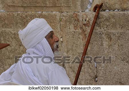 African Jew praying at the Western or Wailing Wall, Muslim Quarter, Old City, Jerusalem, Israel, Middle East, Asia View Large Photo Image Stock Photo - African Jew praying at the Western or Wailing Wall, Muslim Quarter, Old City, Jerusalem, Israel, Middle East, Asia. Fotosearch