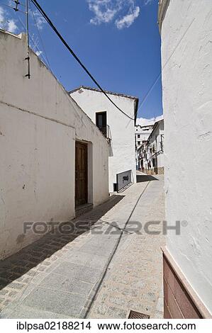 Picture - Alleyway in Setenil de las Bodegas, Pueblos Blancos, White Villages, Andalusia, Spain, Europe. Fotosearch