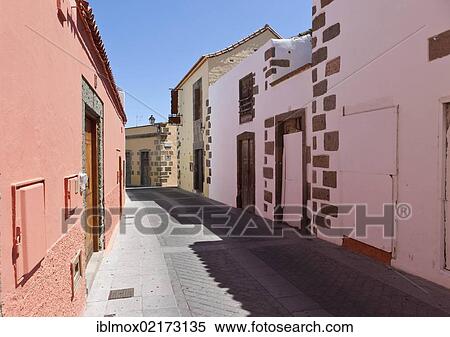 Alleyway in the historic centre of Agueimes, Gran Canaria, Canary Islands, Spain, Europe View Large Photo Image Stock Photography - Alleyway in the historic centre of Agueimes, Gran Canaria, Canary Islands, Spain, Europe. Fotosearch