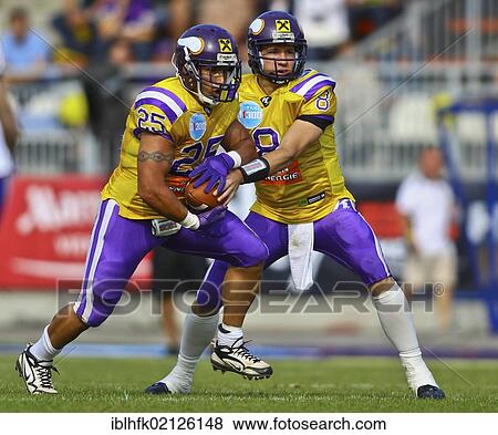 American Football, QB Christoph Gross, No. of the 8 Vikings, handing off the ball to RB Josiah Cravalho, No. 25 of the Vikings; Vienna Vikings win against Graz Giants 19: 14, Vienna, Austria, Europe View Large Photo Image Stock Photo - American Football, QB Christoph Gross, No. of the 8 Vikings, handing off the ball to RB Josiah Cravalho, No. 25 of the Vikings; Vienna Vikings win against Graz Giants 19: 14, Vienna, Austria, Europe. Fotosearch