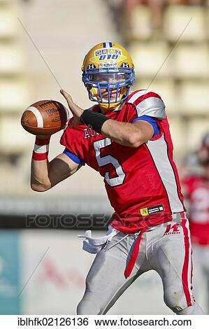 American Football, QB Christoph Gubisch, No. 05 Austria, passing the ball; Team Austria wins the final game of the European Junior Championship against France 24: 14, Seville, Spain, Europe View Large Photo Image Stock Photograph - American Football, QB Christoph Gubisch, No. 05 Austria, passing the ball; Team Austria wins the final game of the European Junior Championship against France 24: 14, Seville, Spain, Europe. Fotosearch