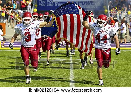 Picture - American Football, the Team of Rose Hulman College entering the Hohe Warte Stadium; Rose Hulman College wins the game against Team Austria 35: 34, Vienna, Austria, Europe. Fotosearch