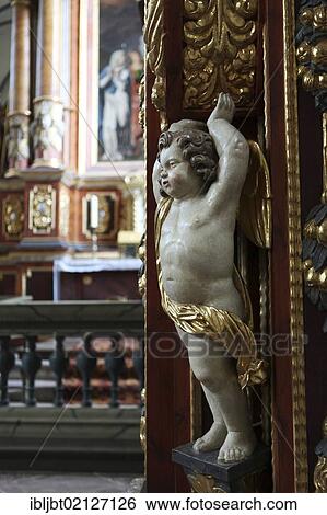 Stock Photograph - Angel in the abbey church, Schloss Corvey castle, former abbey, Hoexter, Weserbergland region, North Rhine-Westphalia, Germany, Europe. Fotosearch