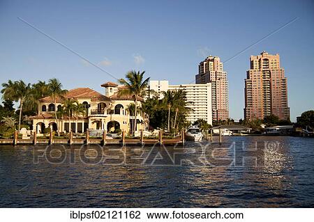 Stock Image - Apartment buildings and luxury villas on the waterfront in the town centre of Fort Lauderdale, Broward County, Florida, USA, North America. Fotosearch