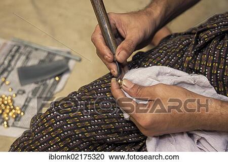 Application of gold leaf, manufacturing elephant jewellery for the Pooram Festival, Thrissur, Kerala, South India, India, Asia View Large Photo Image Stock Image - Application of gold leaf, manufacturing elephant jewellery for the Pooram Festival, Thrissur, Kerala, South India, India, Asia. Fotosearch