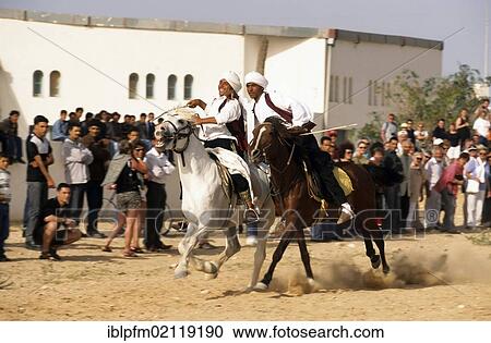 Stock Image - Arabian horse race, Djerba, Tunisia, Africa. Fotosearch