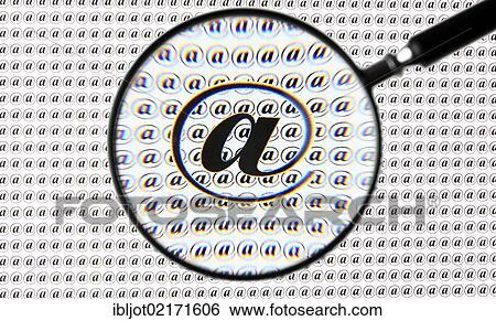 At symbol, @, through a magnifying glass View Large Photo Image Stock Photograph - At symbol, @, through a magnifying glass. Fotosearch