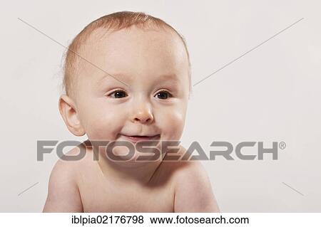 Baby boy, 8 months, portrait View Large Photo Image Stock Photo - Baby boy, 8 months, portrait. Fotosearch
