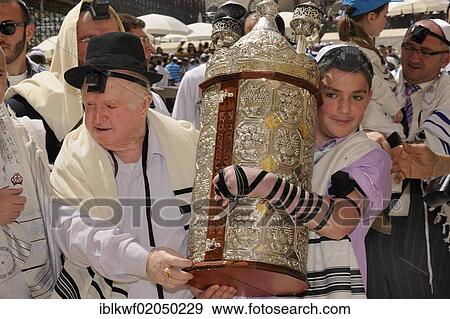 Bar Mitzvah celebration at the Western or Wailing Wall in the direction of the Jewish Quarter, boy is carrying the Torah scroll with the help of his father, Muslim Quarter, Old City, Jerusalem, Israel, Middle East, Asia View Large Photo Image Stock Photo - Bar Mitzvah celebration at the Western or Wailing Wall in the direction of the Jewish Quarter, boy is carrying the Torah scroll with the help of his father, Muslim Quarter, Old City, Jerusalem, Israel, Middle East, Asia. Fotosearch