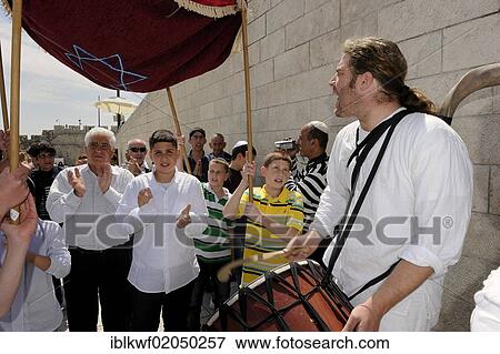 Bar Mitzvah celebration, boy, parents and guests are led to the Western or Wailing Wall to the sound of music, Muslim Quarter, Old City, Jerusalem, Israel, Middle East, Asia View Large Photo Image Stock Photo - Bar Mitzvah celebration, boy, parents and guests are led to the Western or Wailing Wall to the sound of music, Muslim Quarter, Old City, Jerusalem, Israel, Middle East, Asia. Fotosearch