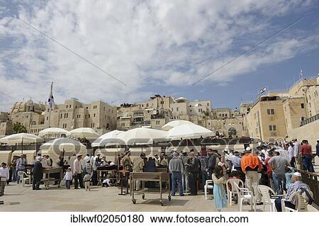 Stock Image - Bar Mitzvah celebration, ceremony of religious maturity, at the Western or Wailing Wall in the direction of the Jewish Quarter, Old City, Jerusalem, Israel, Middle East, Asia. Fotosearch