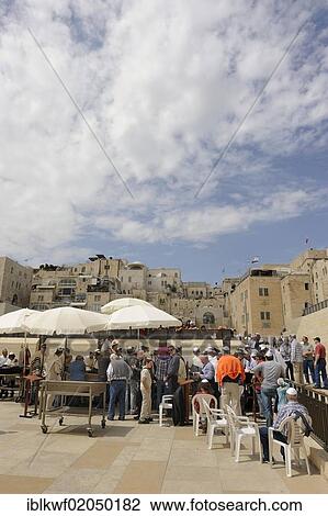 Stock Image - Bar Mitzvah celebration, ceremony of religious maturity, at the Western or Wailing Wall in the direction of the Jewish Quarter, Old City, Jerusalem, Israel, Middle East, Asia. Fotosearch