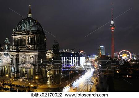 Stock Image - Berliner Dom, Berlin Cathedral and the Television Tower in Alexanderplatz square, Ferris wheel and Christmas market at night, Berlin-Mitte, Berlin, Germany, Europe. Fotosearch