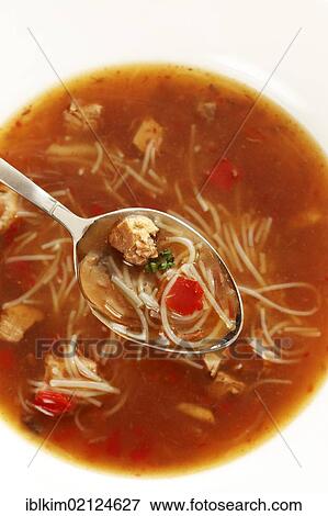 Bihun soup from a can on a white plate and spoon View Large Photo Image Stock Photo - Bihun soup from a can on a white plate and spoon. Fotosearch