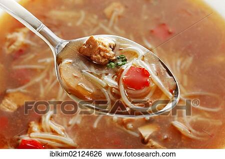 Bihun soup from a can with spoon View Large Photo Image Stock Photograph - Bihun soup from a can with spoon. Fotosearch