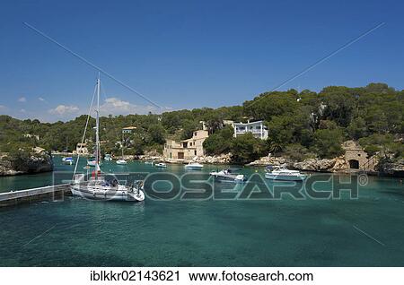 Stock Image - Boats in the small bay of Cala Figuera, Majorca, Balearic Islands, Spain, Europe. Fotosearch