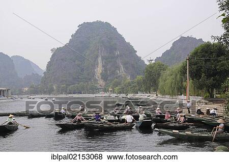 Boats, Tam Coc, Vietnam, Southeast Asia, Asia View Large Photo Image Stock Photo - Boats, Tam Coc, Vietnam, Southeast Asia, Asia. Fotosearch