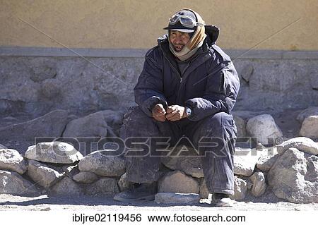 Stock Photograph - Bolivian road worker, Altiplano, Potosi, southern Bolivia, South America. Fotosearch