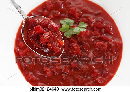 Borscht, Russian, Ukrainian stew from a can, on a white plate and spoon View Large Photo Image Stock Photo - Borscht, Russian, Ukrainian stew from a can, on a white plate and spoon. Fotosearch
