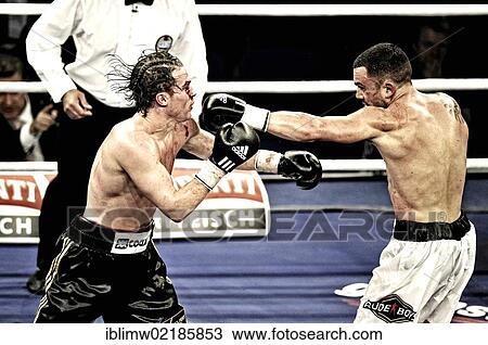 Boxing evening, European Middleweight Championship title match, Dominik Britsch, Germany, black pants, vs. Roberto Santos, Spain, white shorts, Porsche Arena, Stuttgart, Baden-Wuerttemberg, Germany, Europe View Large Photo Image Stock Image - Boxing evening, European Middleweight Championship title match, Dominik Britsch, Germany, black pants, vs. Roberto Santos, Spain, white shorts, Porsche Arena, Stuttgart, Baden-Wuerttemberg, Germany, Europe. Fotosearch