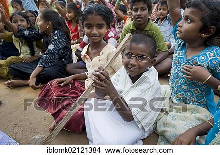 Picture - Boy dressed as Mahatma Gandhi during a demonstration against child labor, Karur, Tamil Nadu, South India, Asia. Fotosearch