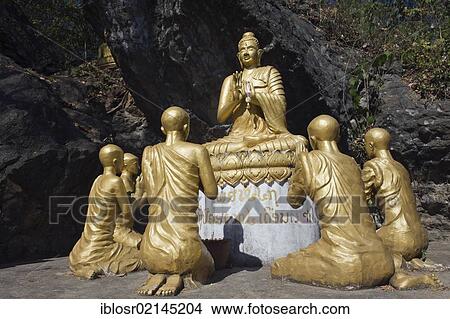 Buddha and his disciples, Buddha statue on Phousi Mountain, Luang Prabang, Laos, Indochina, Asia View Large Photo Image Picture - Buddha and his disciples, Buddha statue on Phousi Mountain, Luang Prabang, Laos, Indochina, Asia. Fotosearch