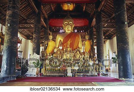 Buddha statue at Wat Visounnarath Temple, Luang Prabang, UNESCO World Heritage Site, Laos, Indochina, Asia View Large Photo Image Picture - Buddha statue at Wat Visounnarath Temple, Luang Prabang, UNESCO World Heritage Site, Laos, Indochina, Asia. Fotosearch
