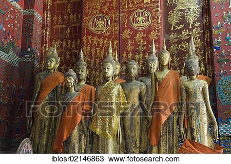 Buddha statues in the funeral chapel, Wat Xieng Thong temple, Luang Prabang, Laos, Indochina, Asia View Large Photo Image Stock Image - Buddha statues in the funeral chapel, Wat Xieng Thong temple, Luang Prabang, Laos, Indochina, Asia. Fotosearch