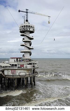 Bungee jumping at the Pier of Scheveningen, Den Haag, The Hague, Dutch North Sea coast, Holland, Netherlands, Benelux, Europe View Large Photo Image Stock Image - Bungee jumping at the Pier of Scheveningen, Den Haag, The Hague, Dutch North Sea coast, Holland, Netherlands, Benelux, Europe. Fotosearch