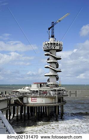 Bungee jumping at the Pier of Scheveningen, Den Haag, The Hague, Dutch North Sea coast, Holland, Netherlands, Benelux, Europe View Large Photo Image Stock Image - Bungee jumping at the Pier of Scheveningen, Den Haag, The Hague, Dutch North Sea coast, Holland, Netherlands, Benelux, Europe. Fotosearch