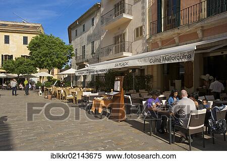 Stock Photography - Café, restaurant in the historic centre of Alcudia, Majorca, Balearic Islands, Spain, Europe. Fotosearch