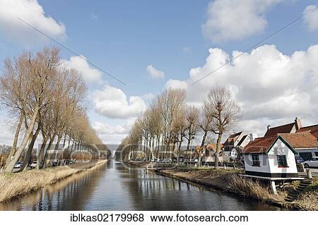 Canal from Bruges to Damme, in spring, West Flanders, Belgium, Europe View Large Photo Image Stock Photo - Canal from Bruges to Damme, in spring, West Flanders, Belgium, Europe. Fotosearch