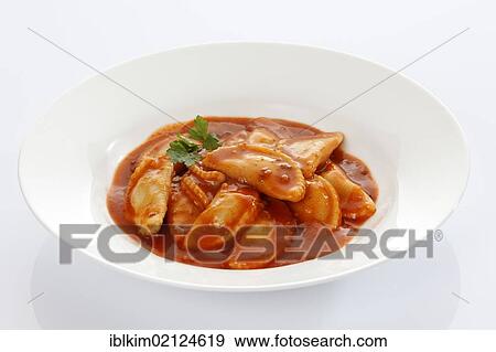 Canned ravioli on a white plate View Large Photo Image Stock Photo - Canned ravioli on a white plate. Fotosearch