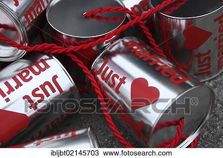 Cans or tins labelled "just married", for tying to the wedding car View Large Photo Image Stock Image - Cans or tins labelled "just married", for tying to the wedding car. Fotosearch