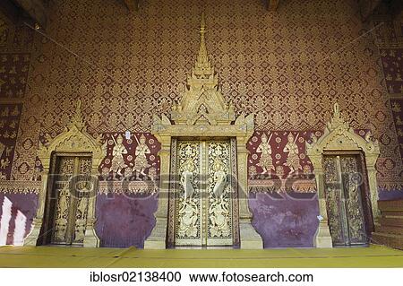 Stock Image - Carved entrance door to Wat Sene Temple, Wat Sensoukharam, Luang Prabang, UNESCO World Heritage Site, Laos, Indochina, Asia. Fotosearch