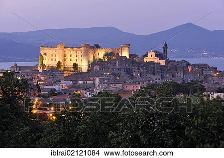 Picture - Castello Odescalchi, fortress, cathedral Duomo Santo Stefano and Lago di Bracciano, Bracciano, Lazio, Italy, Europe. Fotosearch