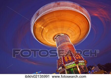 Chair swing ride or Chair-O-Planes at night, Oktoberfest, Munich, Bavaria, Germany, Europe View Large Photo Image Stock Image - Chair swing ride or Chair-O-Planes at night, Oktoberfest, Munich, Bavaria, Germany, Europe. Fotosearch