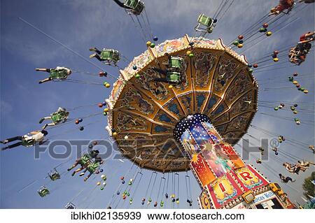 Chair swing ride or Chair-O-Planes, Oktoberfest, Munich, Bavaria, Germany, Europe View Large Photo Image Stock Photo - Chair swing ride or Chair-O-Planes, Oktoberfest, Munich, Bavaria, Germany, Europe. Fotosearch