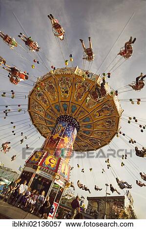 Stock Photo - Chair swing ride or Chair-O-Planes, Oktoberfest, Munich, Bavaria, Germany, Europe. Fotosearch