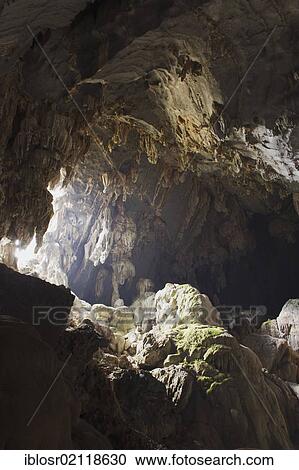 Chang Cave, stalactite or limestone cave in karst rock formations, Vang Vieng, Vientiane, Laos, Indochina, Asia View Large Photo Image Stock Image - Chang Cave, stalactite or limestone cave in karst rock formations, Vang Vieng, Vientiane, Laos, Indochina, Asia. Fotosearch
