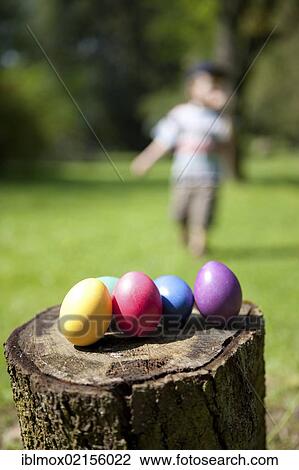 Child, about 4 years, searching for Easter eggs, Hesse, Germany, Europe View Large Photo Image Stock Image - Child, about 4 years, searching for Easter eggs, Hesse, Germany, Europe. Fotosearch